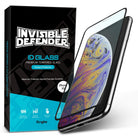 iPhone XS Screen Protector | Invisible Defender Glass - iPhone XS Screen Protector - Invisible Defender glass packaging next to an iPhone XS with a screen protector being applied.