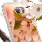 Galaxy S7 Edge Case | Mirror - Rose gold mirror phone case reflecting soft pink cherry blossoms in a bright, airy setting.