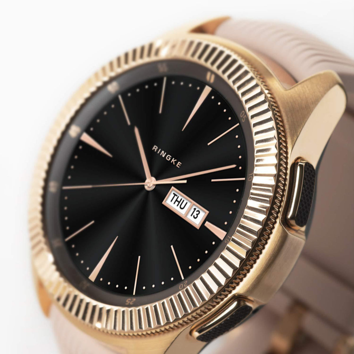 Galaxy Watch (42mm) | Bezel Styling - Rose gold fluted bezel ring on a black smartwatch with a light pink silicone band.