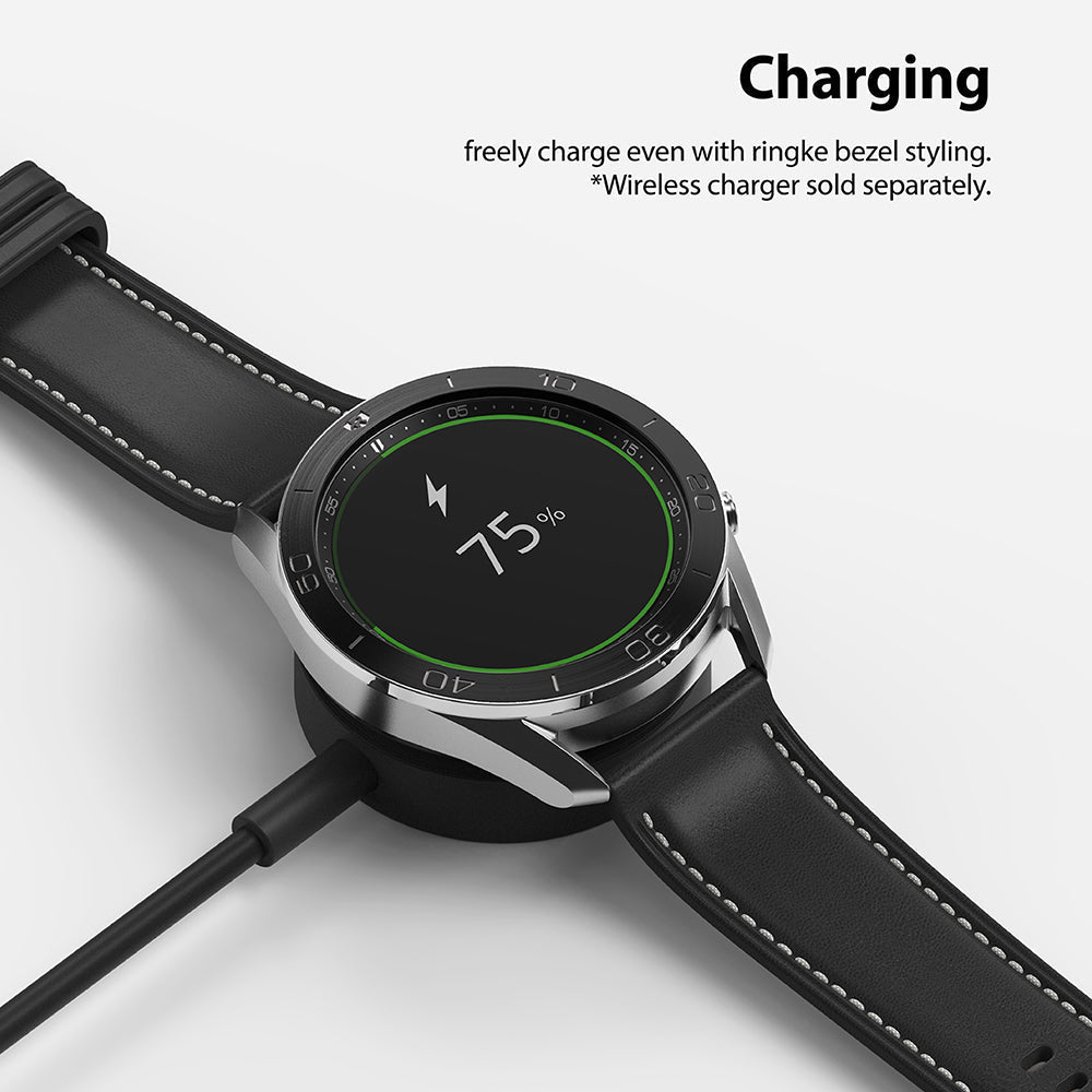 Galaxy Watch 3 (45mm) | Bezel Styling - A Galaxy Watch 3 with a metal bezel ring charging wirelessly on a black dock.