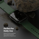 Apple Watch 9 / 8 / 7 (45mm) Case | Slim - Apple Watch with green band under a large rock, highlighting scratch and dust protection.