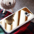 Galaxy S7 Case | Mirror - Gold reflective phone case on plaid fabric with a small felt sheep toy reflecting in the surface.