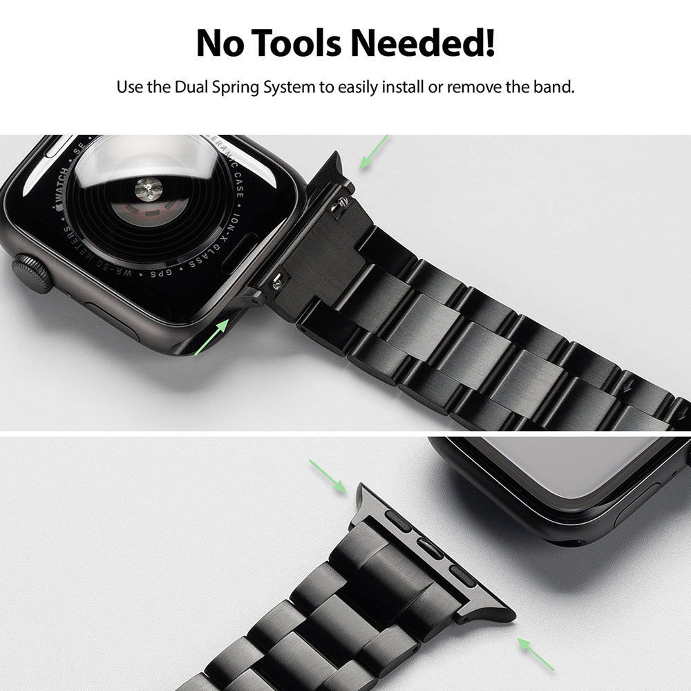 Apple Watch 49·46·45·44·42 mm | Metal One Band - Close-up of a black metal watch band attaching to an Apple Watch via a dual spring system.
