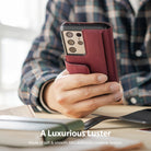 Galaxy S21 Ultra Case | Folio Signature+ - A hand holds a burgundy leather folio case on a Galaxy S21 Ultra phone.