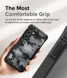 Galaxy A35 Case | Fusion-X - Hand holding a camo-patterned phone case with textured side grips for improved stability.