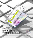 Galaxy A35 Screen Protector | Easy Slide Tempered Glass - Galaxy A35 Screen Protector - Easy Slide installation tool applying tempered glass to a Galaxy A35 smartphone.
