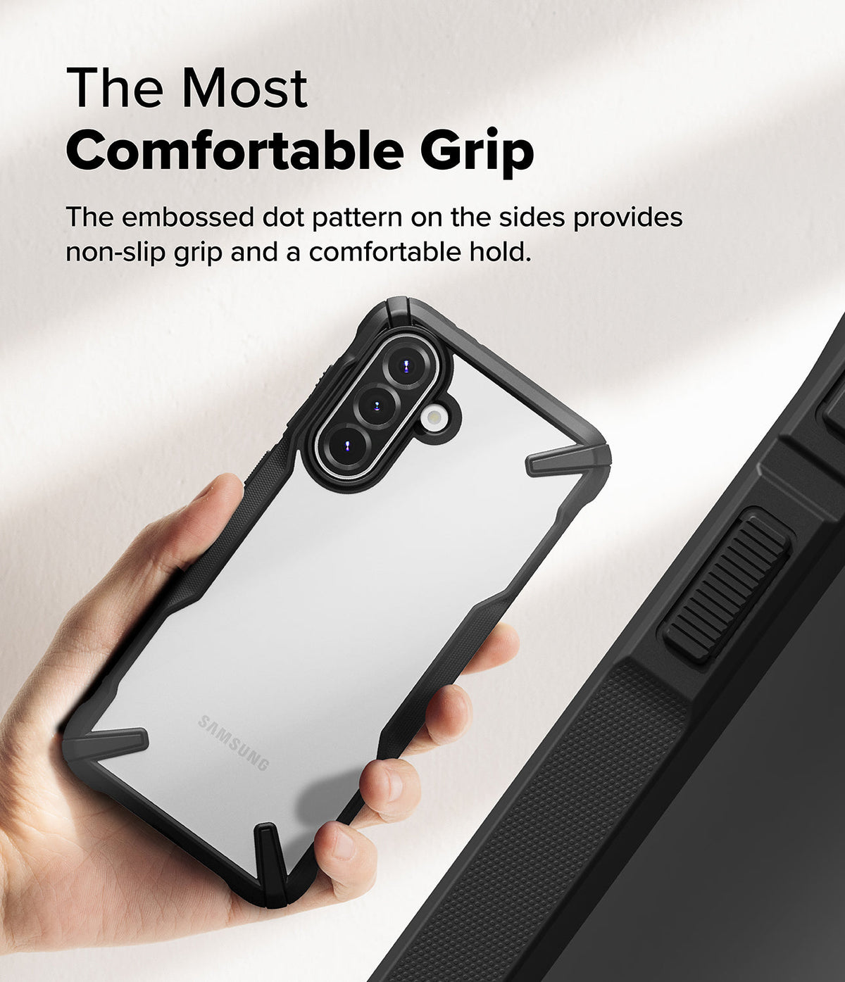 Galaxy A36 / A56 Case | Fusion-X - Hand holding a clear phone case with a black bumper featuring a textured, non-slip dot pattern.