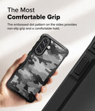 Galaxy A36 / A56 Case | Fusion-X - Hand holding a camo-patterned phone case with textured side grips for comfort.
