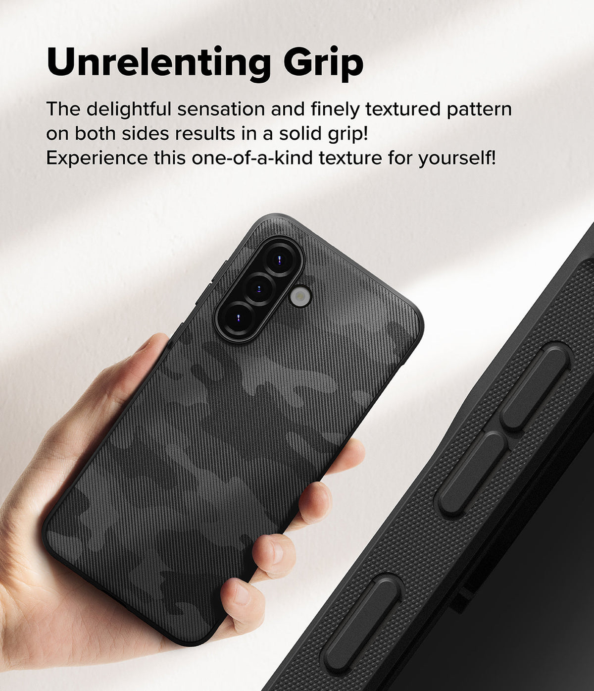Galaxy A36 / A56 Case | Onyx - Hand holding a black camo-patterned phone case with a textured grip and triple camera cutout.