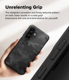 Galaxy A36 / A56 Case | Onyx - Hand holding a black camo-patterned phone case with a textured grip and triple camera cutout.