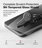 Galaxy A56 / A36 Screen Protector | Easy Slide Tempered Glass - Galaxy A56 / A36 Screen Protector - A metal key rests on a 9H tempered glass screen protector applied to a smartphone.