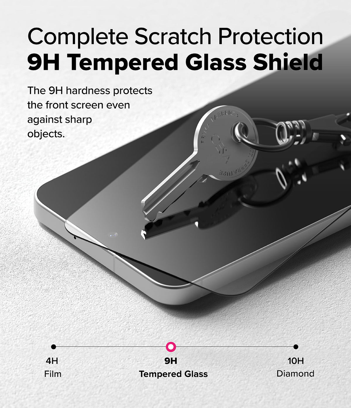 Galaxy A56 / A36 Screen Protector | Easy Slide Tempered Glass - Galaxy A56 / A36 Screen Protector - A metal key rests on a smartphone screen protected by 9H tempered glass.