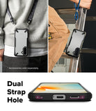 Galaxy A57 5G Case | Fusion-X - Phone case with dual strap holes shown worn on a lanyard and hanging from a ladder.