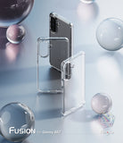 [Bundle] Galaxy A57 | Fusion - Clear phone case for Galaxy A57 displayed with floating glass spheres on a reflective surface.