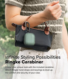 AirPods 5 / 4 Case | Air - A green AirPods 4 case attached to a black handbag with a metal carabiner.