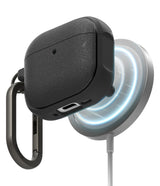 AirPods 5 / 4 Case | Onyx Magnetic - Black textured AirPods 4 case with a carabiner attached to a glowing magnetic wireless charger.
