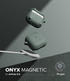 AirPods 5 / 4 Case | Onyx Magnetic - Two sage green AirPods 4 cases floating above a magnetic wireless charger on a dark surface.