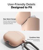 AirPods 5 / 4 Case | Silicone Case - Close-up of a beige silicone case showing a rear hinge notch and a side carabiner attachment.