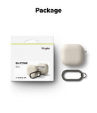 AirPods 5 / 4 Case | Silicone Case - Stone-colored silicone AirPods 4 case, retail packaging, and a matching carabiner clip.