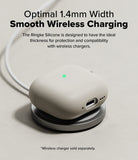 AirPods 5 / 4 Case | Silicone Case - AirPods 4 Case - Beige silicone case on a wireless charging pad with a glowing green status light.