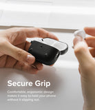 AirPods Pro 2 Case | Onyx - Hands holding an open black textured AirPods Pro 2 case with white earbuds inside.