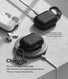 AirPods Pro 2 Case | Onyx - Black textured cases on wireless and wired chargers with visible green status lights.