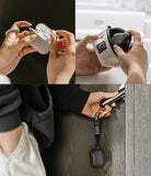 AirPods Pro 2 Case | Onyx - Hands using, storing, and carrying a black protective AirPods Pro 2 case with a wrist strap.