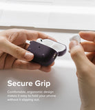 AirPods Pro 2 Case | Onyx - Hands holding an open dark textured AirPods Pro 2 case with white earbuds inside.