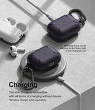 AirPods Pro 2 Case | Onyx - Onyx AirPods Pro 2 cases charging via wired and wireless pads with visible green status lights.