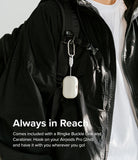 AirPods Pro 2 Case | Silicone - White silicone case attached to a black backpack strap via a carabiner and buckle link.