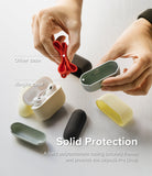 AirPods Pro 2 Case | Silicone - Hands comparing a flexible red silicone case to a sturdy, rigid Ringke protective case.