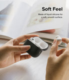 AirPods Pro 2 Case | Silicone - Hands holding a matte black silicone case with one white earbud inside and another in hand.