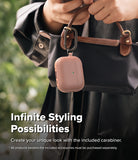 AirPods Pro 3 Case | Onyx Magnetic - A dusty pink AirPods Pro case with a black carabiner attached to a handbag.