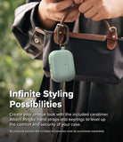 AirPods Pro 3 Case | Onyx Magnetic - Sage green AirPods Pro case with a black carabiner attached to a black handbag.