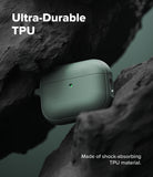 AirPods Pro 3 Case | Onyx Magnetic - Matte green AirPods Pro case nestled between dark, jagged rocks with a glowing status light.