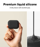 AirPods Pro 3 Case | Silicone - AirPods Pro 3 Case - Hand holding a black silicone case next to a stream of liquid silicone.