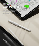 Apple Pencil Case | Silicone Drafting Grip Holder - Apple Pencil Case - White silicone drafting grip on an Apple Pencil resting on a desk near a tablet with digital sketches.