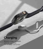 Apple Watch Ultra 3 / 2 / 1 Case | Slim - Apple Watch Ultra in a slim black case hovering above a wireless charging puck.