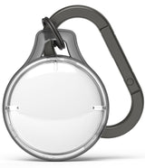 AirTag Case | Slim [1 Pack] - A clear, circular AirTag protective case attached to a dark gray carabiner clip.