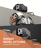 Apple Watch 11 / 10 (42mm) Cover | Bezel Styling - Multiple Apple Watches with metallic bezel covers on tiered platforms.