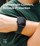 Apple Watch 12 46mm | Slim (2P) - A black smartwatch with a matte black band worn on a person's wrist, set against a dark green shirt. White text overlays read 'Lightweight Comfort, Reliable Protection' at the top and 'Weight 1.