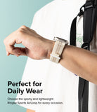 Apple Watch 42·41·40·38 mm | Sports Air Loop - Person wearing a beige woven sports watch band on an Apple Watch.