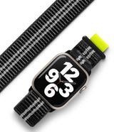 Apple Watch 42·41·40·38 mm | Sports Air Loop - Black and white woven watch band with neon yellow tab on Apple Watch.