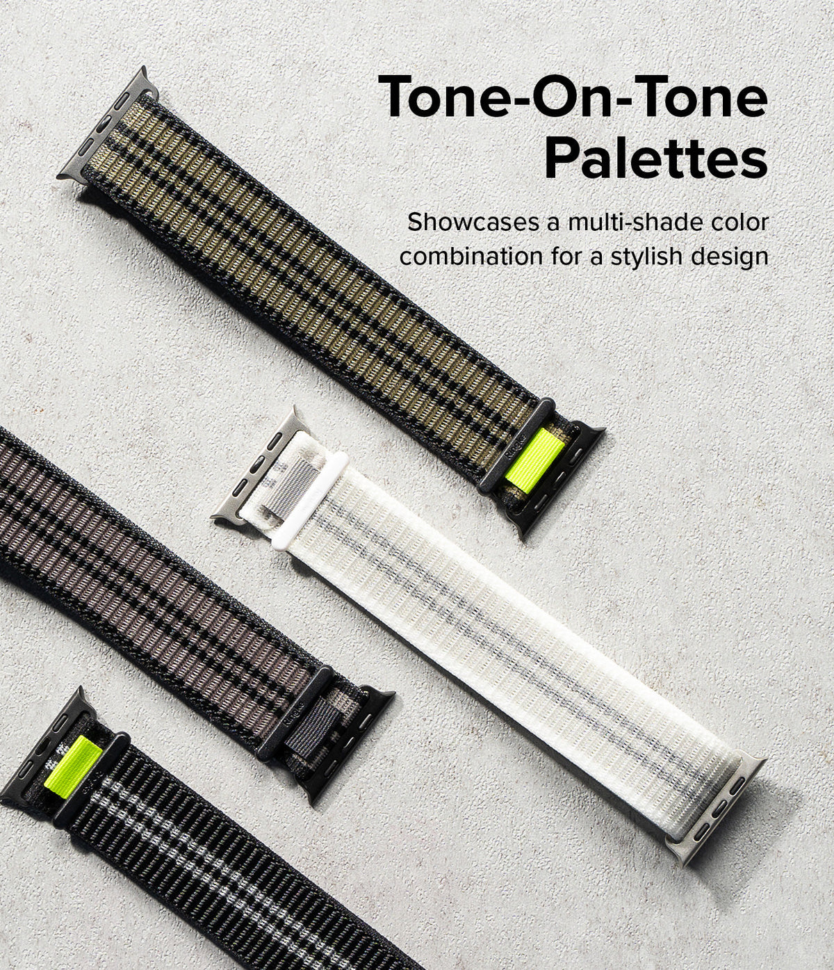 Apple Watch 49·46·45·44·42 mm | Sports Air Loop - Apple Watch Sports Air Loop - Three textured fabric watch bands in black and white with neon green accents on a gray surface.