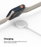 Apple Watch Series 6 / 5 / 4 / SE  (44mm) Case | Slim (2 Pack) - Apple Watch Series 6 / 5 / 4 / SE (44mm) Case | Slim (2 Pack) - Apple Watch with navy case charging on wireless puck.