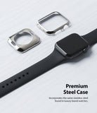 Apple Watch Series 6 / 5 / 4 / SE (44mm) | Full Frame - Two silver stainless steel watch cases beside a black Apple Watch.