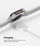 Apple Watch Series 6 / 5 / 4 / SE (44mm) | Full Frame - Silver Apple Watch with protective case hovering over a wireless charger.