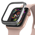 Apple Watch Series 6 / 5 / 4 / SE (40mm) | Premium Bezel Styling Silver + Black - Silver and black bezel hovering over a gold Apple Watch with a pink sport band.