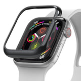 Apple Watch Series 6 / 5 / 4 / SE (44mm) | Bezel Styling - A glossy black protective bezel hovering above an Apple Watch.