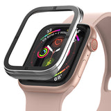Apple Watch Series 6 / 5 / 4 / SE (44mm) | Bezel Styling - A black metal bezel cover hovering above a pink Apple Watch.